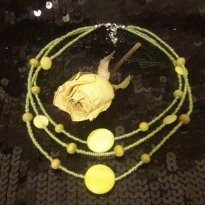 Vtg Irridescent yellow wood & stone bead necklace